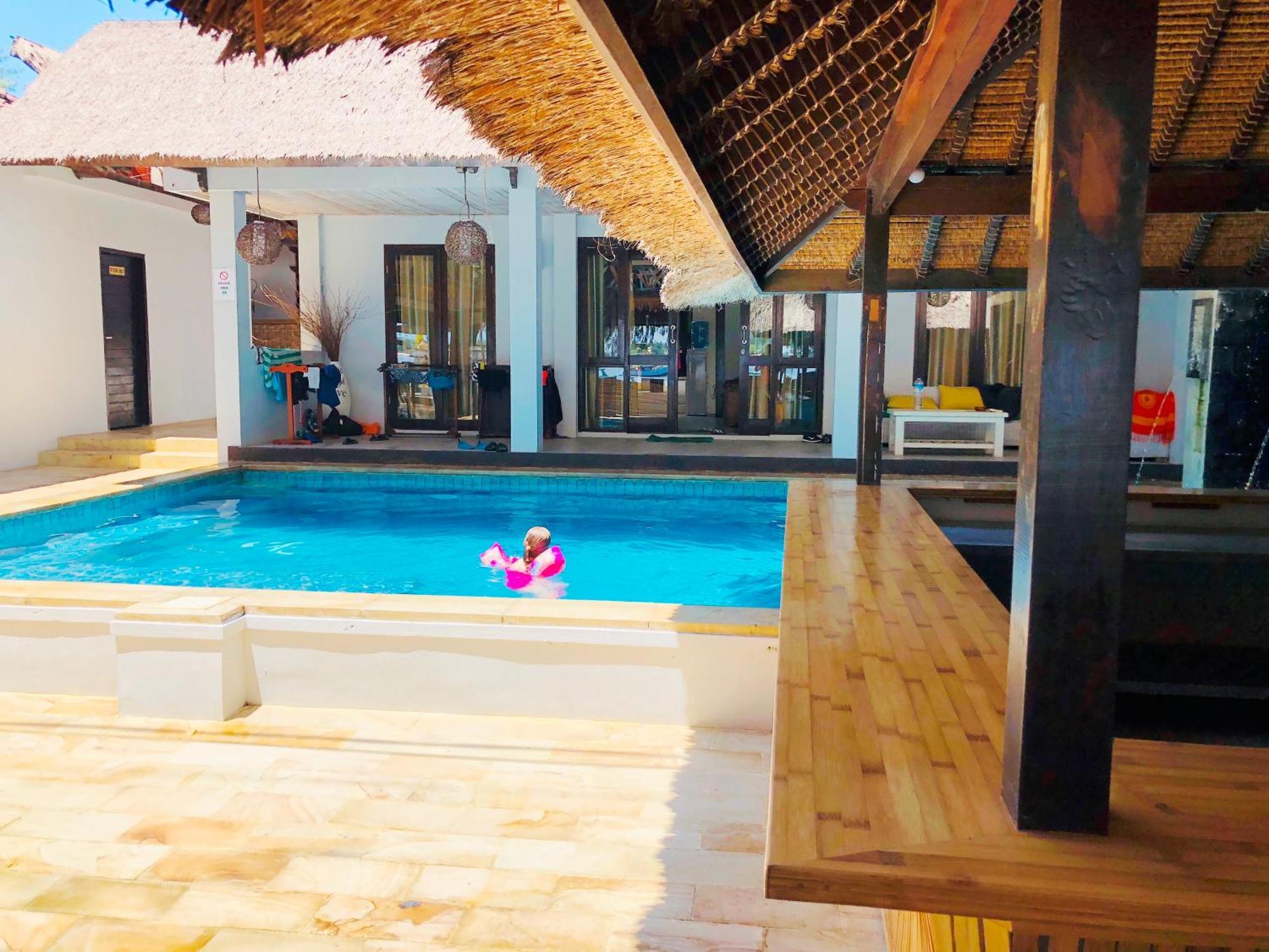 Three-Bedroom Beachfront Villa with Pool Access