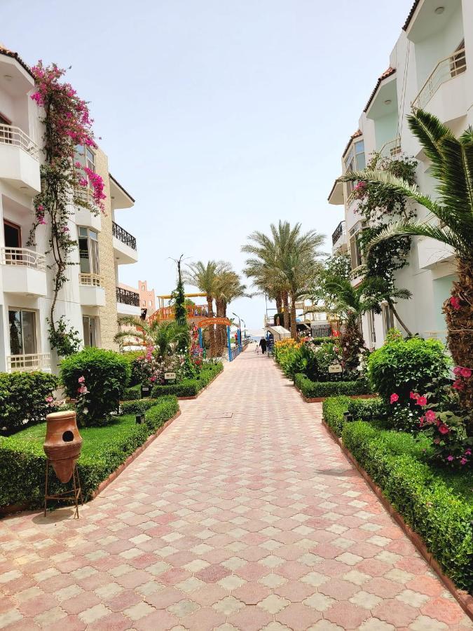 Standard  Triple Room with Partial Sea and Garden View