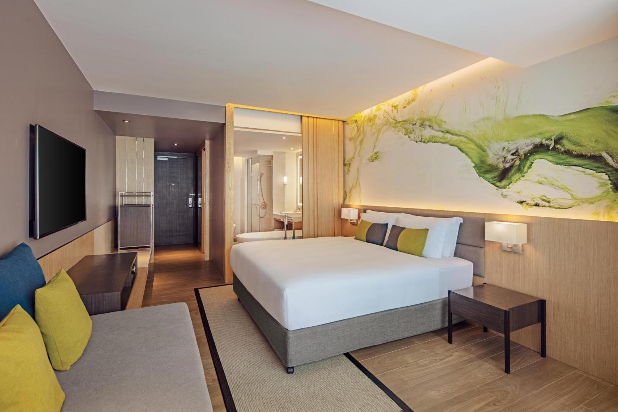 Chambre Lit King-Size Premium - Côté Piscine