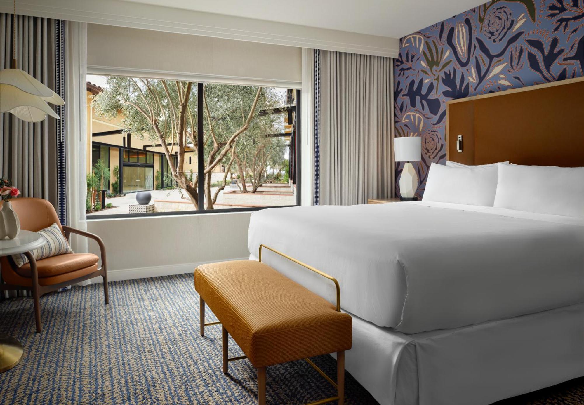 One-Bedroom Family Suite with One King Bed and Two Single Beds,1758343645:JPEG